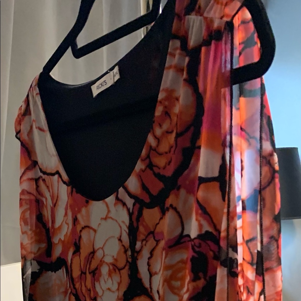 3/$30 Floral blouse, banded at bottom, open sides.